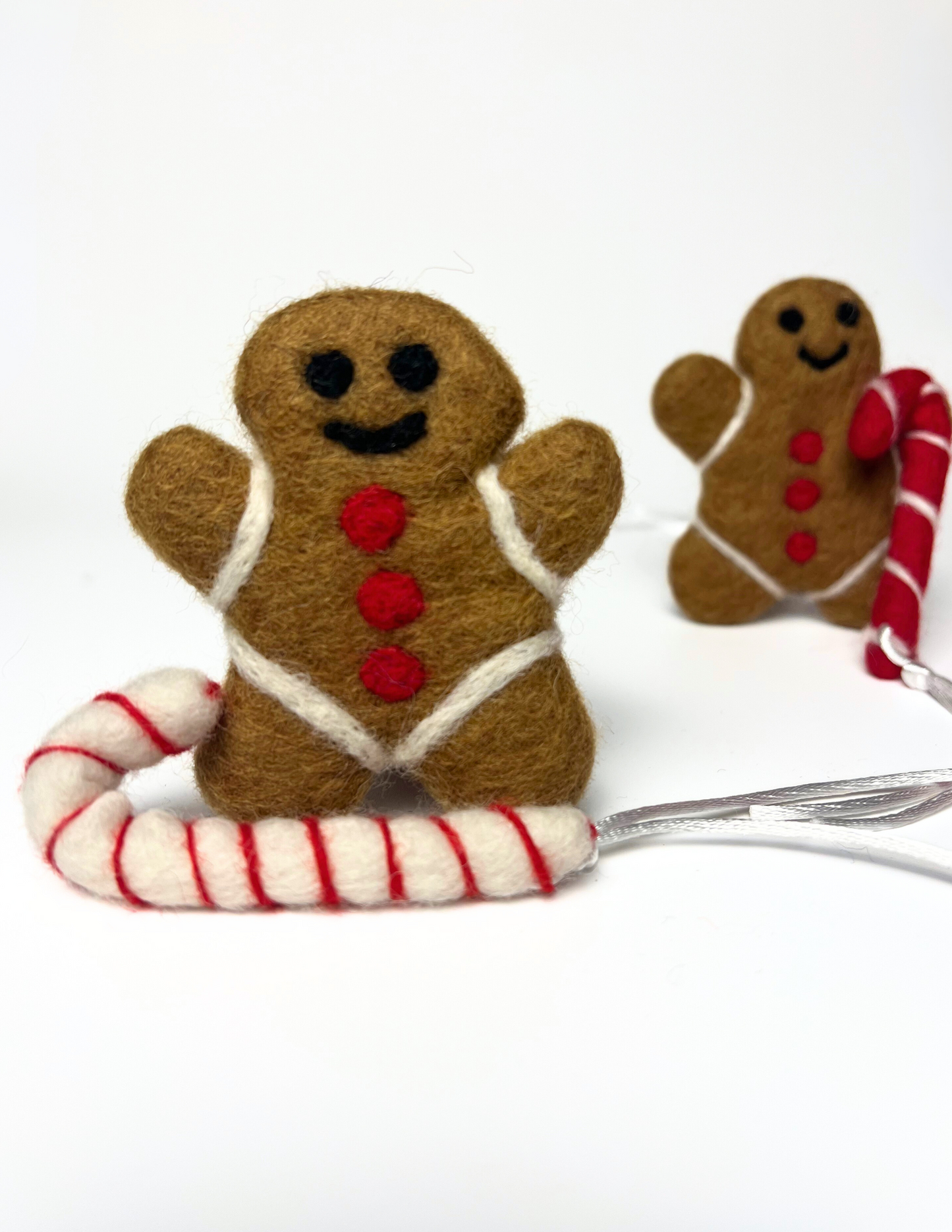 Gingerbread man and candy cane wool catnip toy